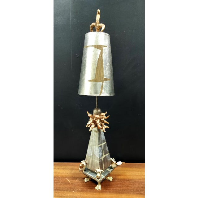 Elegant statement lamp by Lucas Mckearn. Obelisk body with biomorphic elements and hand applied gold and silver leaf....