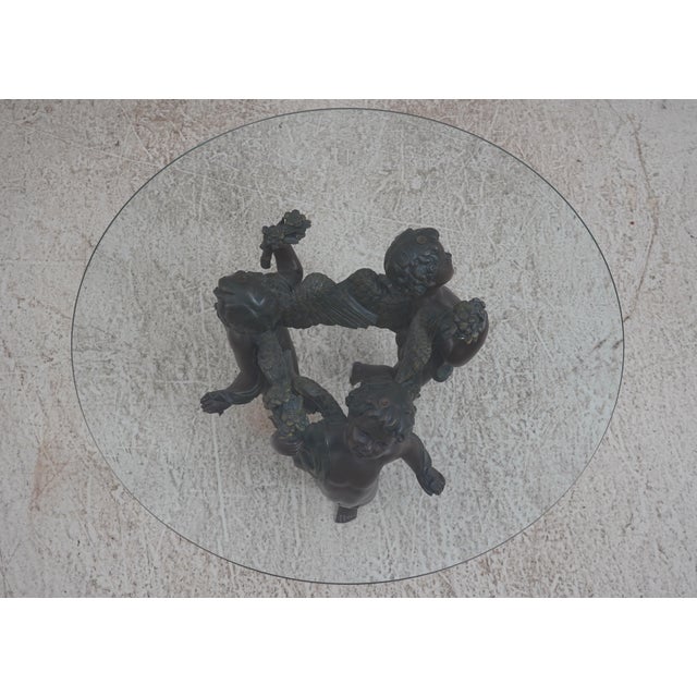 Age: Approx: 20 Years Old Details: Beveled Glass Top Large Impressive Table Nice Standing Cherub Base Bronze Finish On...