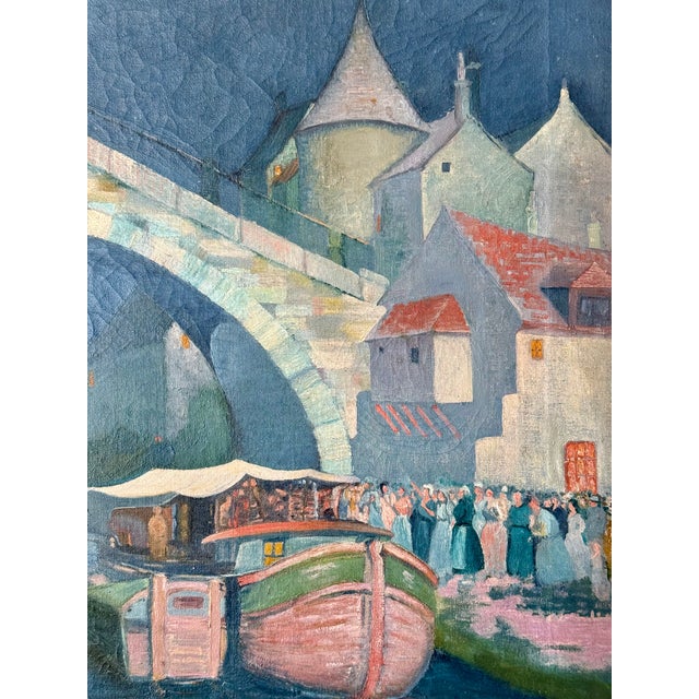 An unusual, early twentieth century painting of a European town at night. Vast swathes of indigo river and sky contrast...