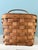 Vintage baskets have a way of bringing texture, warmth, and a sense of history to a space, and this charming picnic basket...
