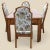 Bring timeless design into your home with this Hollywood Regency dining set in a stunning burl wood finish. Design...