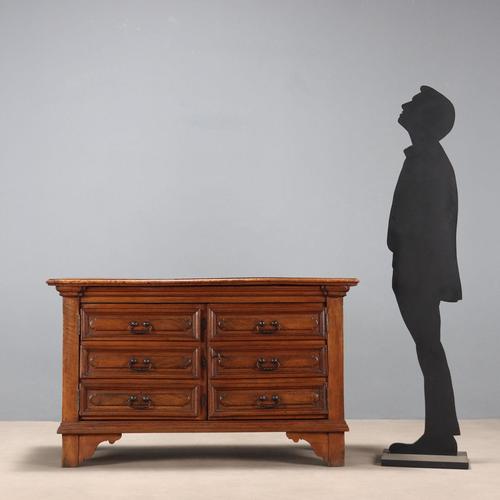 Walnut cupboard constructed from antique wood. Doors carved from the fronts of three drawers, bracket legs. Italy, late...