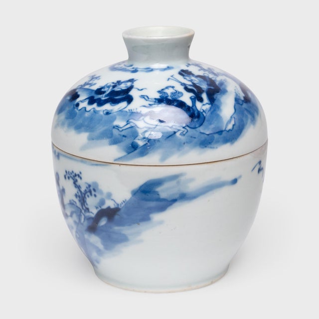 Dated to the early 20th century, this antique porcelain jar is a lovely example of Chinese blue-and-white porcelain. The...