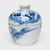 Dated to the early 20th century, this antique porcelain jar is a lovely example of Chinese blue-and-white porcelain. The...