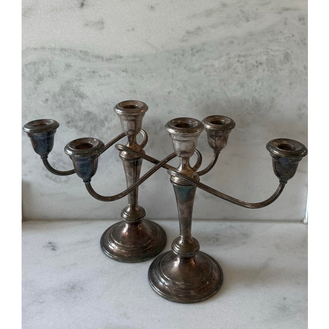 Pair of silver plated twisted branch 3-arm candelabras. These candles can be deconstructed is 3 different design...