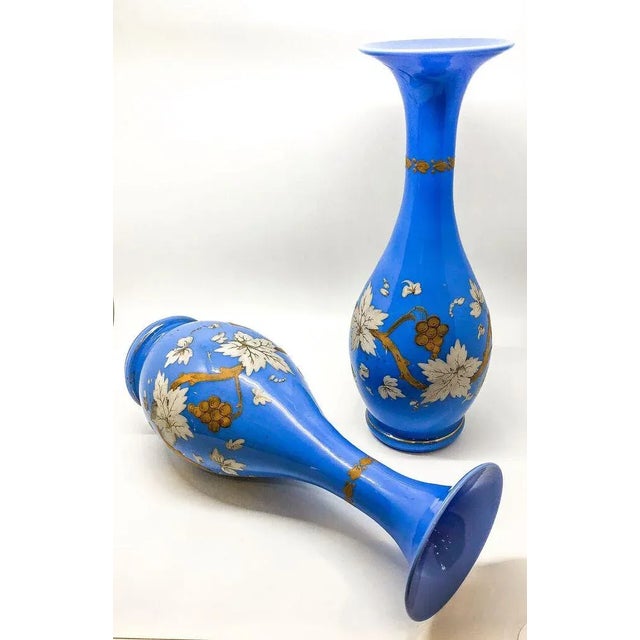 Vintage blue vases with cream floral detail