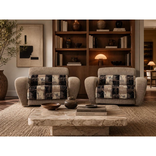 Pair of vintage Weiman lounge chairs with a bold, sculptural presence and unmistakable postmodern character. Each chair...