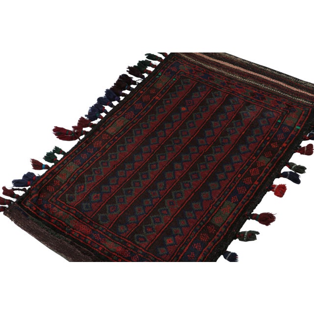 Hand knotted in wool, this 6x8 Baluch rug represents a new line of tribal carpets in the Modern Classics Collection by Rug...