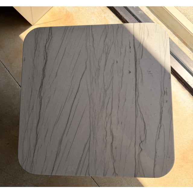 Bring organic modern style to your space with this sophisticated end table, featuring a flared wood pedestal base topped...