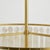Gorgeous layers of Capiz shell, in alternating circles and rectangles, dangle from an Aged Brass frame for a sophisticated...