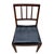 Handsome vintage wood side chair featuring a warm, dark-stained frame and a sleek black upholstered seat. The chair has a...