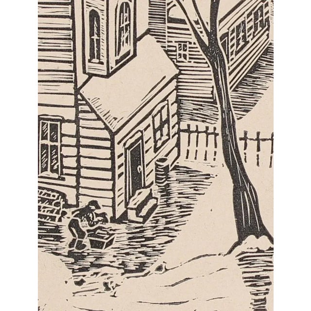 A snowy neighborhood landscape linoleum block print on paper by San Leandro, CA artist Mary Watterick Evans, circa 1940s....