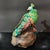 Mid 20th Century 1. **Hand-Painted Ceramic Peacock Statue, Blue-Green-Yellow-Red Plumage, Floral Base** For Sale - Image 5 of 7