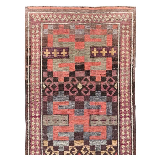A vintage Turkish Anatolian long runner handmade during the mid-20th century. Measures: 2' 11" x 15' 5".
