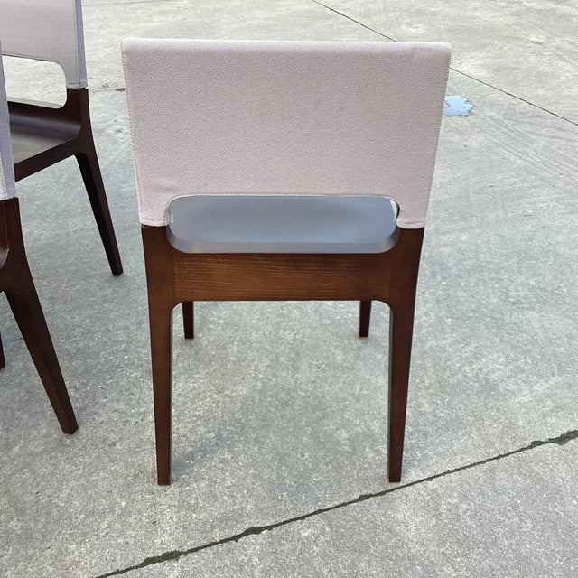 You will love this ultra-chic set of Ligne Roset French dining chairs. With straight, contemporary lines, these chairs...