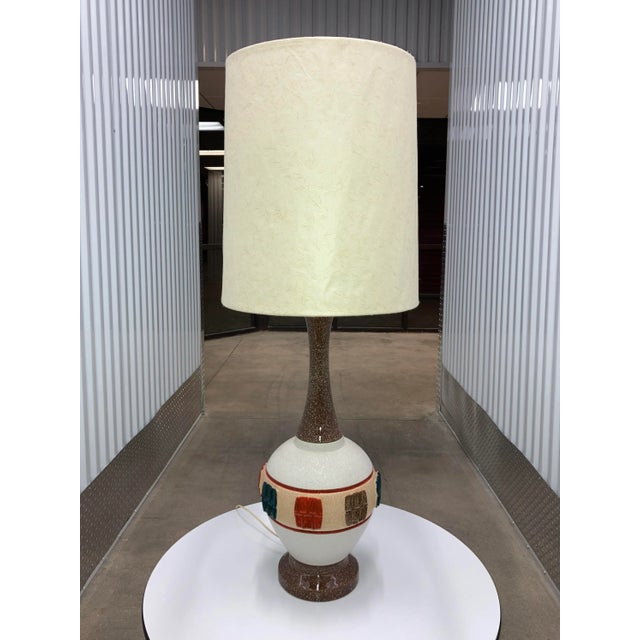 Vintage glazed ceramic painted tall table lamp, and large barrel paper shade, manner of Quartite Creative Corp. Shade...
