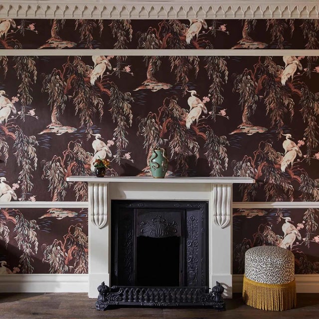 Artfully hand painted in watercolour, 'ZEUS' depicts an idyllic river scene with elegant cranes and majestic weeping...