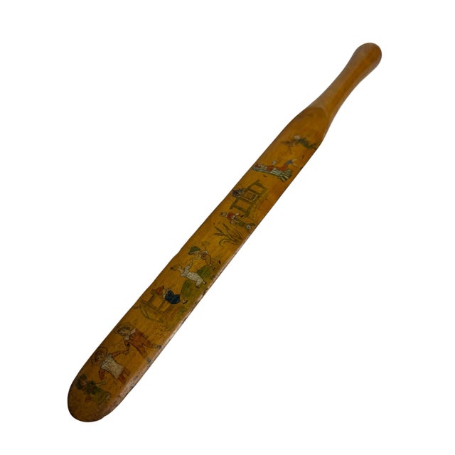 A rare and exceptional antique Victorian wooden paper knife with hand-painted figural decoration covering both sides in...