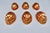 A set of six vintage copper molds, each cast in a deeply fluted, gadrooned oval form and finished with a tin lining and...