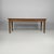 Italian art deco wooden dining table, 1930s Dining table in wood with pronounced grain, rectangular top and tapered legs...