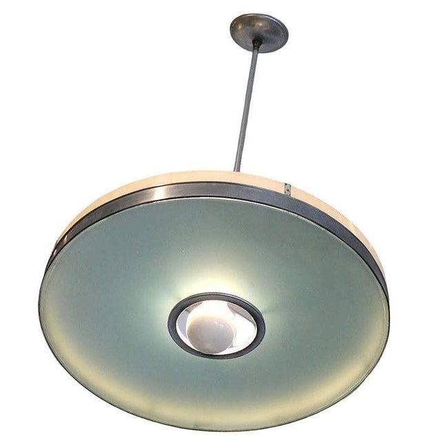 "This is the last one of 38" Streamlined Aluminum Ceiling Lamp from the Historic May Company Wilshire. This sleek, mid-...