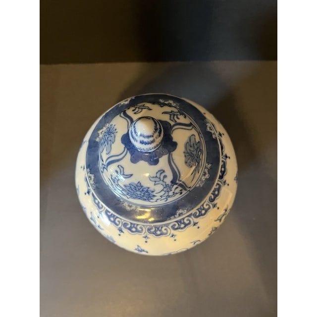 Add timeless elegance to your home with this beautiful blue and white porcelain ginger jar. Featuring a classic...