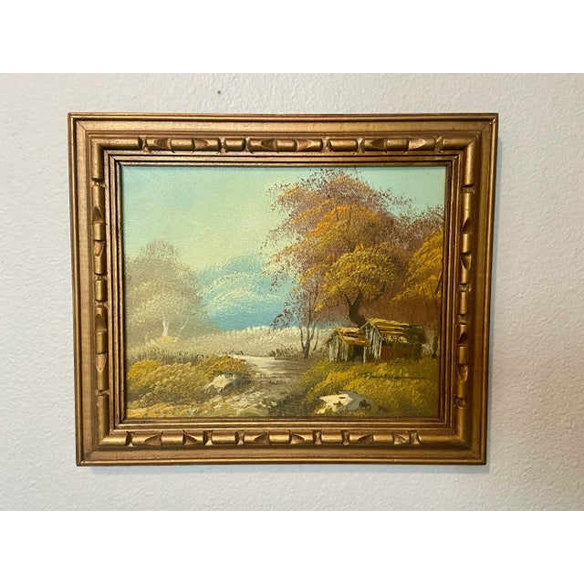 This is an original oil painting circa 1970’s of a fall countryside mountain landscape. it has a little shed nestled in a...