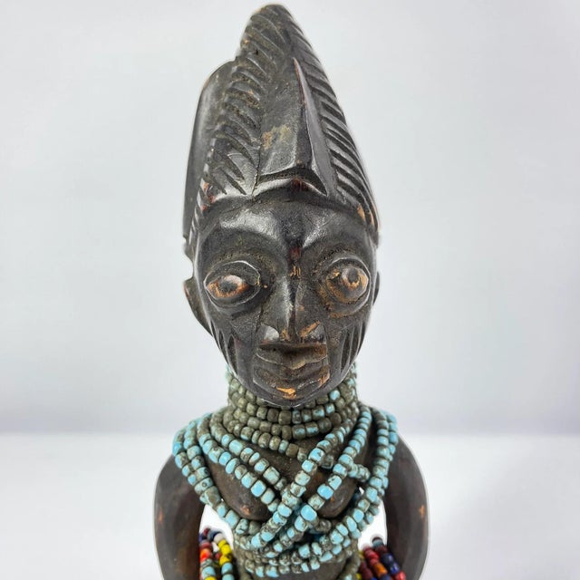 Ibeji figures, carved by the Yoruba people of Nigeria, are wooden twin sculptures holding cultural significance in Yoruba...