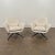 Discover timeless comfort in this Minotti Jensen Swivel Chair, upholstered in soft bone-colored leather that combines...