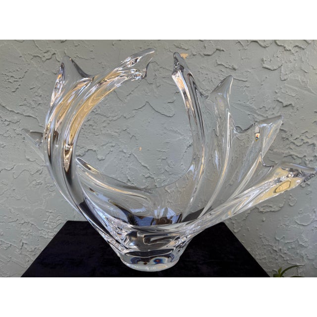 This striking sculptural centerpiece is crafted in clear crystal by Vannes-le-Châtel, one of France’s most respected art...