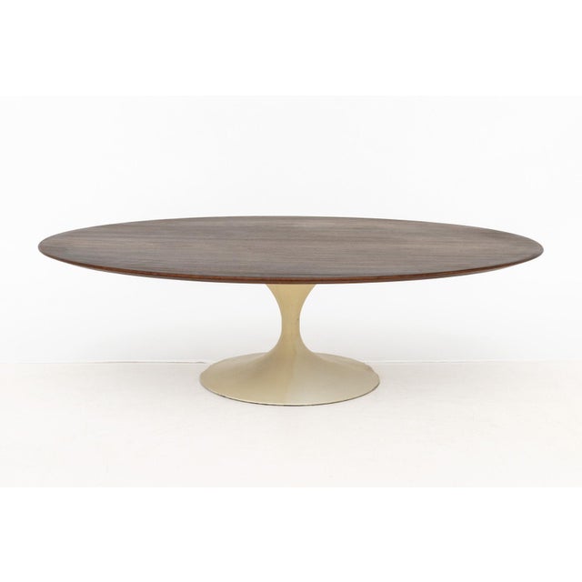 Eero Saarinen for Knoll Walnut Top Tulip Coffee Table, mid-20th century, patinated white metal base, "Knoll / Knoll...