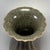 Classic Chinese official‑style celadon lobed vase, featuring elegant scalloped flower‑shaped rim and distinct melon‑ribbed...