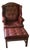 1975 Hancock & Moore Burgundy Full-Grain Leather Wingback Executive Armchair and Ottoman Set. Tufted For Sale