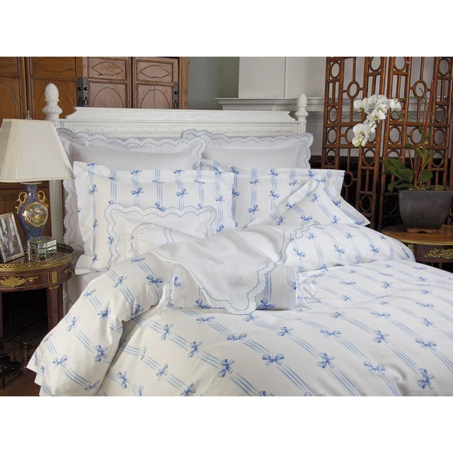 *Please note, this listing is for a duvet cover only The irrepressible delight of ribbons and bows, printed in Blue, Pink...