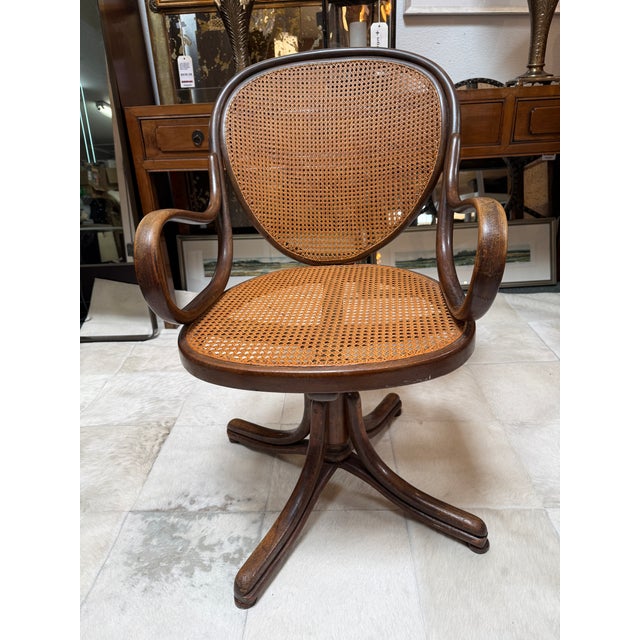 Design Plus Gallery presents the 19th Century Swivel Chair by Michael Thonet, for Thonet. The chair has a distinctive...