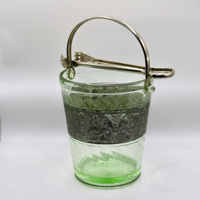 Elevate your bar cart with this striking 1930s Art Deco green depression glass ice bucket. Featuring a radiant optic swirl...