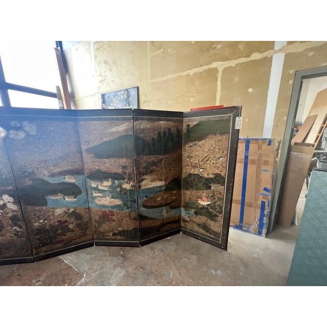 This beautiful early japanese Edo Period Screen consists ofa blue stream with ducks passing through a field of...