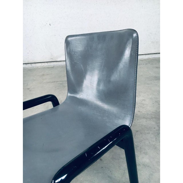 Vintage Postmodern Design Leather Dining Chair set of 4. Made in Italy, 1980's. Grey leather seat on black gloss lacquered...