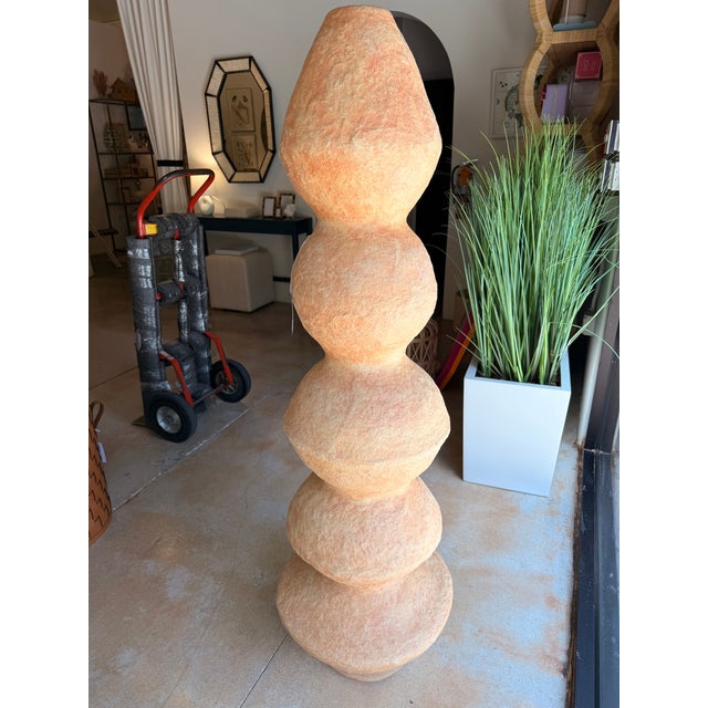 Make a statement with this striking paper mâché floor sculpture, a sculptural accent that blends organic modern and...
