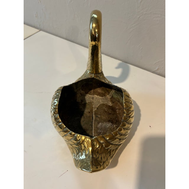 A graceful vintage brass swan planter, full of charm and decorative appeal. The detailing is exceptional—from the finely...