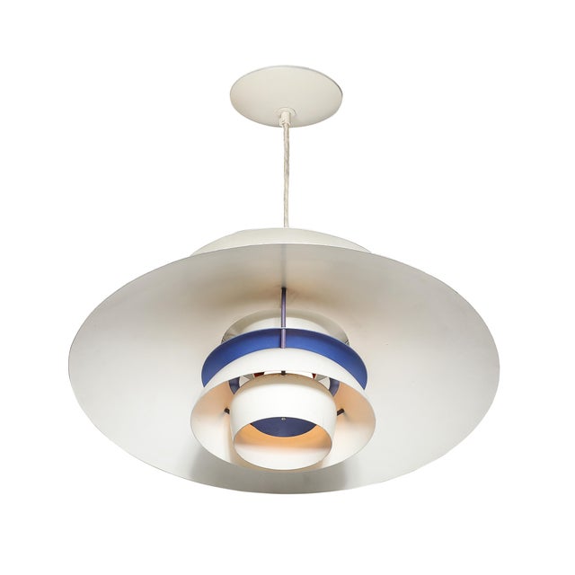 Illuminate your space with this Mid-Century Modernist PH5 Pendant Chandelier. Designed by Poul Henningsen for Louis...