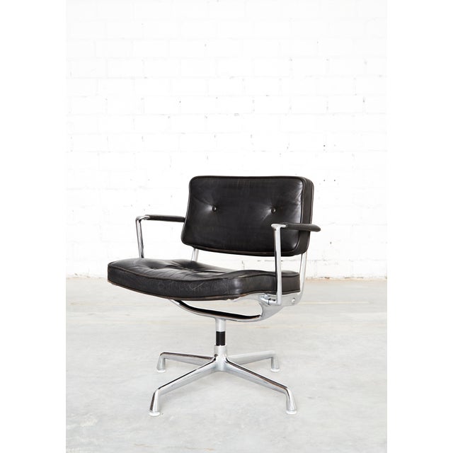 Condition: Good condition with age-appropriate signs of use. The leather on the armrests shows some wear. The designer duo...