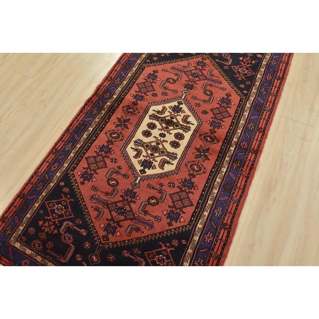 This authentic vintage tribal Hamedan rug is hand-knotted with fine wool and natural dyes. This nomadic oriental rug...