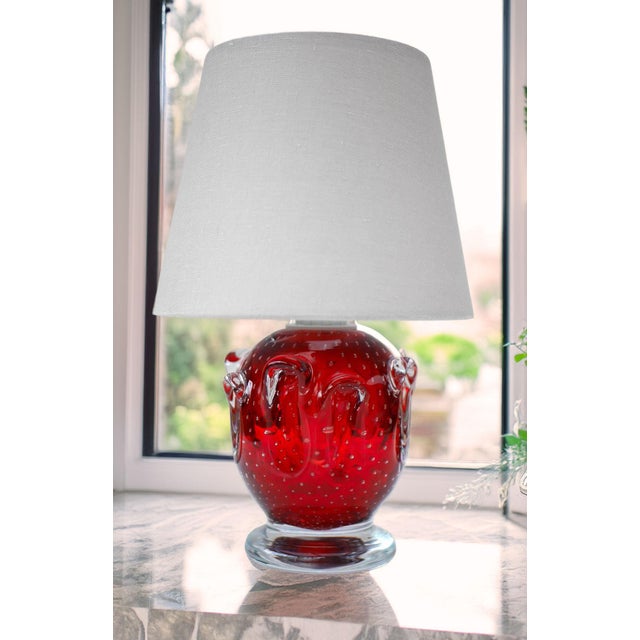 A stunning bright red mid-century modern crystal lamp made by the talented börne augustsson for åseda, sweden during the...