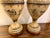 Pair of large decorative vases by Theodore Alexander, handmade in Vietnam. Each features an ivory crackle finish with...