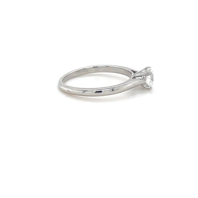 Diamond cut: Round Brilliant Carat: 0.55 ct. Grading: I color, VS1 clarity Metal: Platinum Ring size: 7 1/4 Stamp: 950Pt...