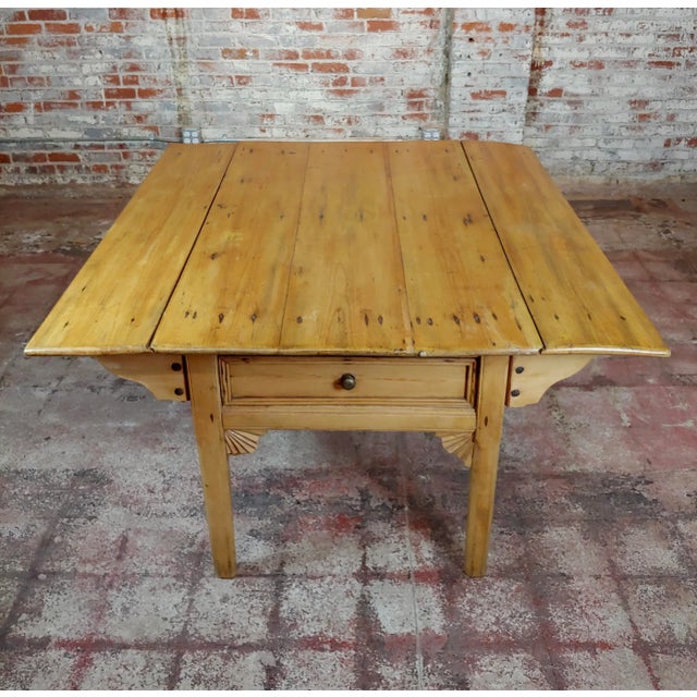 19th century French farmhouse pine drop leaf dining table. A beautiful piece that will add to your décor! Size 62 x 33 x...