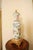 Large vase hand-painted with floral decor. The vase is complemented by polished brass mounts. Excellent condition. Signed...