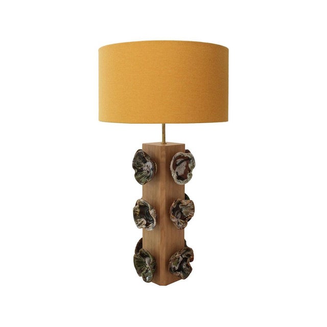 Pair of table lamps designed by la studio. Made with an oak base and german ceramic pieces from the 1960s. Shades...