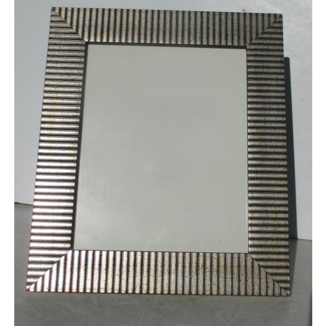 Smart and energetic black silver tone banded framing with crackled yellowish pinstripes. and black pattern, sometimes...